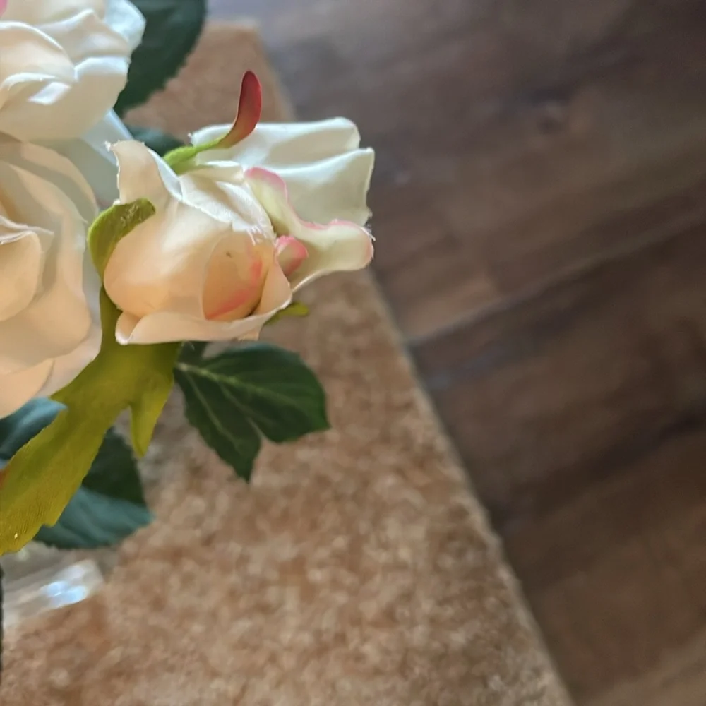 Beautiful realistic looking blooming rose with bud